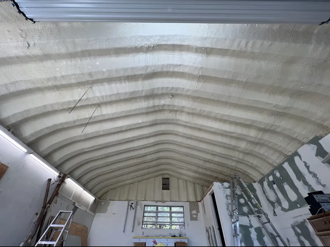 Spray polyurethane foam applied to the underside of a metal roof deck in Bloomington
